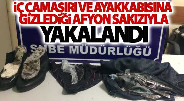 İç çamaşırı ve ayakkabısına gizlediği afyon sakızıyla yakalandı
